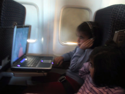 The girls on the plan on the way to Cincinnati, watching a DVD on the laptop.
It was a H.R. Puffinstuff DVD
